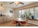 Dining room with hardwood floors, large windows, and plenty of natural light at 20995 County Road 28, Hudson, CO 80642