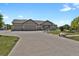 Lovely single-story home featuring a three-car garage and a well-manicured front yard at 4714 Carmichael Ct, Brighton, CO 80603