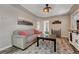 Cozy living room with stylish rug, modern lighting, and comfortable seating arrangement at 3201 S Pearl St, Englewood, CO 80113