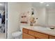 Bathroom with single sink vanity and neutral tones at 12348 W Gould Ave, Littleton, CO 80127