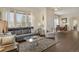 Bright and airy living room with large windows and modern furnishings at 12348 W Gould Ave, Littleton, CO 80127