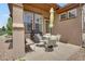 Outdoor patio with seating area, perfect for relaxing and entertaining guests at 12348 W Gould Ave, Littleton, CO 80127