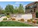 Landscaped entrance sign for the Dancing Willows community at 12348 W Gould Ave, Littleton, CO 80127