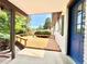Inviting covered porch with wooden deck and ample seating at 4192 S Vrain St, Denver, CO 80236