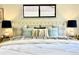 Comfortable bedroom showcasing soft textiles, side tables, and a window that provides natural lighting at 4192 S Vrain St, Denver, CO 80236
