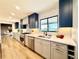 Bright kitchen offering modern appliances, ample counter space, and seamless transition to the living area at 4192 S Vrain St, Denver, CO 80236