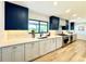 Well-designed kitchen featuring modern appliances, stylish cabinetry, and a bright, open layout at 4192 S Vrain St, Denver, CO 80236