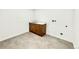 Dedicated laundry space with tile flooring, sink and cabinet at 4192 S Vrain St, Denver, CO 80236