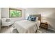 Cozy bedroom with a comfortable bed, stylish furnishings, and a bright window view at 11072 Zephyr St, Broomfield, CO 80021