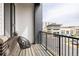 Cozy balcony with modern chair and view of retail space at 8280 E 36Th Ave # 27, Denver, CO 80238