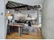 Open-concept living room with exposed ductwork, hardwood floors, and modern furnishings at 1020 15Th St # 210, Denver, CO 80202