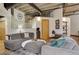 Cozy living room featuring comfortable seating, exposed ductwork, and plenty of natural light at 1020 15Th St # 210, Denver, CO 80202