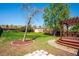Spacious backyard featuring a wooden deck with pergola and storage shed at 13895 W Atlantic Ave, Lakewood, CO 80228
