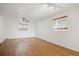Bonus room with two windows, and ample space for relaxation or entertainment at 13895 W Atlantic Ave, Lakewood, CO 80228