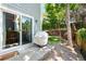 A pleasant patio area right outside the sliding door leads to the backyard area with mature trees and nice landscaping at 10262 Spotted Owl Ave, Highlands Ranch, CO 80129