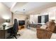 Finished basement bedroom with desk and chair setup at 10262 Spotted Owl Ave, Highlands Ranch, CO 80129