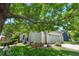 Charming home with a well-manicured front yard and mature shade tree at 10262 Spotted Owl Ave, Highlands Ranch, CO 80129