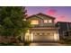 Charming two-story home with a well-maintained lawn and inviting curb appeal at 10262 Spotted Owl Ave, Highlands Ranch, CO 80129
