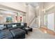 Inviting living room with plush seating, high ceilings, and natural light at 10262 Spotted Owl Ave, Highlands Ranch, CO 80129