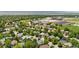 Aerial view of community showcasing tree-lined streets and proximity to amenities at 10262 Spotted Owl Ave, Highlands Ranch, CO 80129