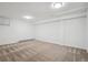 Finished basement space with carpeted floors and recessed lighting at 9189 Fallen Rock Rd, Conifer, CO 80433