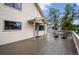 Exterior view of a large stained wood deck with an outdoor seating arrangement at 9189 Fallen Rock Rd, Conifer, CO 80433