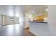 Efficient kitchen featuring a breakfast bar, light wood cabinets, stainless steel appliances, and plenty of natural light at 444 17Th St # 301, Denver, CO 80202