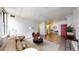 Bright living room featuring hardwood floors, large windows, and a stylish seating area with contemporary furnishings at 444 17Th St # 301, Denver, CO 80202