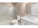 Bathroom features glass enclosed shower, toilet, and marble vanity at 3266 Yale Dr, Broomfield, CO 80023