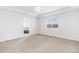 Spacious bedroom with a tray ceiling and carpet at 3266 Yale Dr, Broomfield, CO 80023