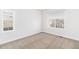 Empty bedroom with carpet and large windows providing natural light at 3266 Yale Dr, Broomfield, CO 80023