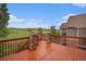Spacious wet deck with stone pillars and a beautiful green landscape at 3266 Yale Dr, Broomfield, CO 80023