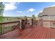 Wood deck offering scenic views of rolling hills and community at 3266 Yale Dr, Broomfield, CO 80023