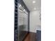 Kitchen showcases stainless steel refrigerator alongside custom cabinetry and convenient built-in wine rack at 1010 Euclid Ave, Boulder, CO 80302