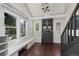 Bright living room features hardwood floors, built-in shelving, and large windows providing ample natural light at 1010 Euclid Ave, Boulder, CO 80302