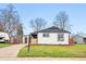 Charming single-story home with a well-maintained lawn and contemporary exterior at 3067 Robin Way, Denver, CO 80222