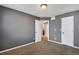 Spacious bedroom with neutral walls, carpeting, and ceiling light at 12535 Forest View St, Broomfield, CO 80020