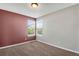 Comfortable bedroom with two sunny windows for natural light at 12535 Forest View St, Broomfield, CO 80020