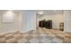 Finished basement area with laundry machines at 12535 Forest View St, Broomfield, CO 80020