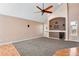 Living room with decorative nook and built-in entertainment center at 12535 Forest View St, Broomfield, CO 80020