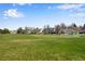 Expansive green soccer field in a Gathering-friendly community with views of nearby homes at 12535 Forest View St, Broomfield, CO 80020