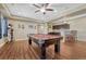 Spacious finished basement featuring a billiards table, perfect for entertainment and relaxation at 2601 Loyd Cir, Parker, CO 80138
