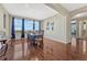 Bright dining room with hardwood floors, large windows, and elegant chandelier at 2601 Loyd Cir, Parker, CO 80138