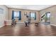 Bright exercise room with abundant natural light, complete with exercise equipment and view at 2601 Loyd Cir, Parker, CO 80138
