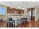 Well-appointed kitchen with stainless steel appliances, granite countertops, and a center island with bar seating at 2601 Loyd Cir, Parker, CO 80138