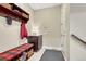 Cozy mudroom features a bench with storage and a coat rack near the home entrance at 2601 Loyd Cir, Parker, CO 80138