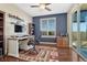 Charming home office with ample natural light and sleek desk setup at 2601 Loyd Cir, Parker, CO 80138