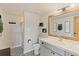 Stylish bathroom with modern fixtures, decorative tile flooring, and updated vanity, creating a spa-like retreat at 7575 E Windlawn Way, Parker, CO 80134