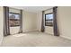 Bright bedroom with large windows, neutral carpet and curtains at 7575 E Windlawn Way, Parker, CO 80134