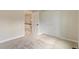 Neutral bedroom with soft carpeting and large closet at 7575 E Windlawn Way, Parker, CO 80134